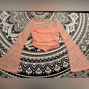 Long sleeve blouse with bell sleeves; sheer